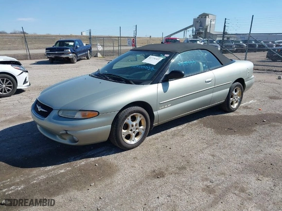 1999 Chrysler Sebring Jxi with VIN 3C3EL55H6XT603058, listed as a IAAI auction lot 41774322 with 157,852 mi miles. Bid and sale history available at carsss.com. Image 2.