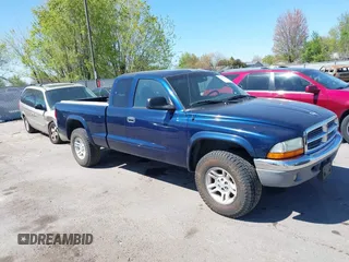2001 Dodge Dakota Sport z VIN 1B7GG22N21S276507, wystawiony jako IAAI lot #42072844 z przebiegiem 225 874 mil mil oraz . Historia ofert i sprzedaży dostępna na DreamBid. Obrazek 1.