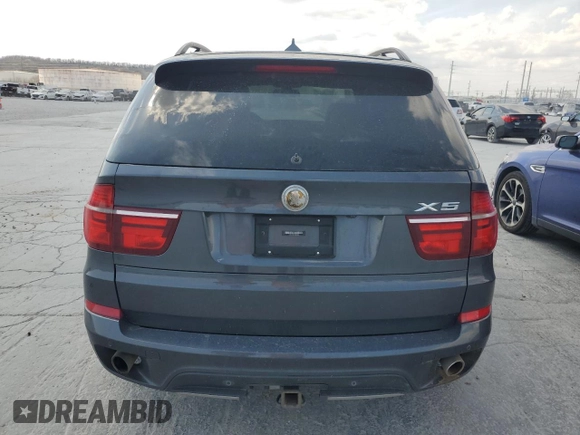 2013 BMW X5 xDrive35i z VIN 5UXZV4C54D0B14923, wystawiony jako Copart lot #50929385 z przebiegiem 249 533 mil mil oraz Tytuł czysty. Historia ofert i sprzedaży dostępna na DreamBid. Obrazek 6.