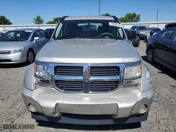 2009 Dodge Nitro SE with VIN 1D8GT28K19W541402, listed as a Copart auction lot 57487874 with 189,653 mi miles and Salvage Title. Bid and sale history available at carsss.com. Image 5.