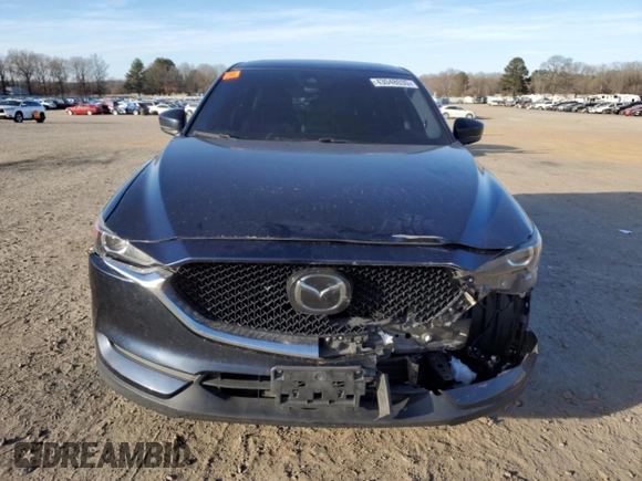 2018 Mazda CX-5 Touring with VIN JM3KFACM4J0470374, listed as a Copart auction lot 43048035 with 125,440 mi miles and Salvage Title. Bid and sale history available at carsss.com. Image 5.