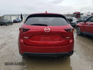 2019 Mazda CX-5 Touring with VIN JM3KFBCMXK0632631, listed as a Copart auction lot 45414485 with 80,795 mi miles and Salvage Title. Bid and sale history available at DreamBid. Image 6.