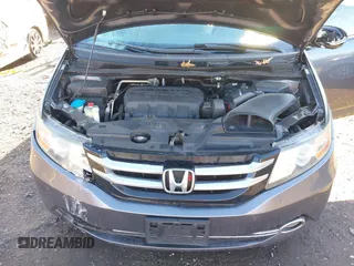 2014 Honda Odyssey Touring with VIN 5FNRL5H94EB081267, listed as a IAAI auction lot 41199509 with 146,827 mi miles and . Bid and sale history available at DreamBid. Image 10.