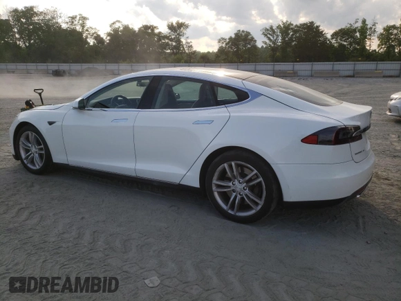 2014 Tesla Model S 60 с VIN 5YJSA1H18EFP33284, выставлен на аукционе Copart как лот 57434905 с пробегом 156 750 миль миль и Списание • Salvage title. История ставок и продаж доступна на DreamBid. Изображение 2.