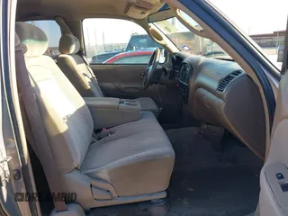 2000 Toyota Tundra SR5 with VIN 5TBRT3413YS019873, listed as a IAAI auction lot 41412497 with 305,472 mi miles and . Bid and sale history available at DreamBid. Image 5.