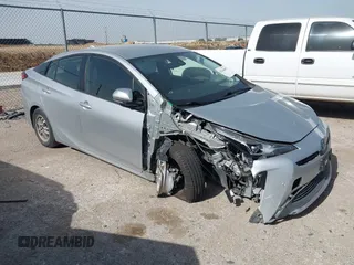 2019 Toyota Prius L Eco z VIN JTDKARFU5K3073984, wystawiony jako IAAI lot #42264485 z przebiegiem 85 151 mil mil oraz . Historia ofert i sprzedaży dostępna na DreamBid. Obrazek 1.