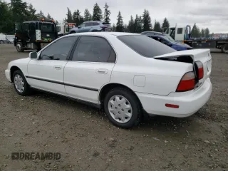1996 Honda Accord LX with VIN 1HGCD5639TA158062, listed as a Copart auction lot 47434945 with 156,519 mi miles and Salvage Title. Bid and sale history available at DreamBid. Image 2.