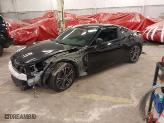 2013 Subaru BRZ Limited with VIN JF1ZCAC19D2610973, listed as a IAAI auction lot 41773897 with 123,634 mi miles. Bid and sale history available at carsss.com. Image 2.