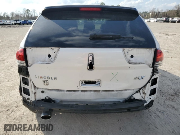 2012 Lincoln MKX with VIN 2LMDJ6JKXCBL19684, listed as a Copart auction lot 43017635 with 159,726 mi miles and Salvage Title. Bid and sale history available at carsss.com. Image 6.