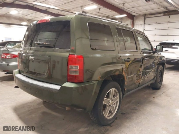 2008 Jeep Patriot Sport with VIN 1J8FF28W58D514209, listed as a IAAI auction lot 41630850 with 122,875 mi miles. Bid and sale history available at carsss.com. Image 4.