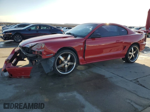 1996 Ford Mustang with VIN 1FALP4041TF234741, listed as a Copart auction lot 85277894 with 113,353 mi miles and Salvage Title. Bid and sale history available at carsss.com. Image 1.