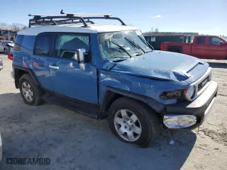 2011 Toyota FJ Cruiser with VIN JTEBU4BF1BK102982, listed as a Copart auction lot 47958985 with 215,418 mi miles and Salvage Title. Bid and sale history available at carsss.com. Image 4.