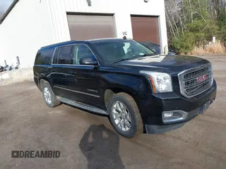 2015 GMC Yukon XL SLT with VIN 1GKS2HKC9FR159164, listed as a IAAI auction lot 41235420 with 136,730 mi miles. Bid and sale history available at carsss.com. Image 1.