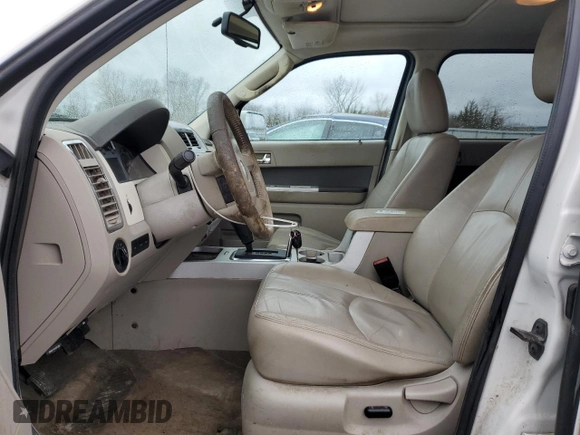 2009 Mercury Mariner Premier with VIN 4M2CU97759KJ15746, listed as a Copart auction lot 83802964 with 180,342 mi miles and Salvage Title. Bid and sale history available at carsss.com. Image 7.