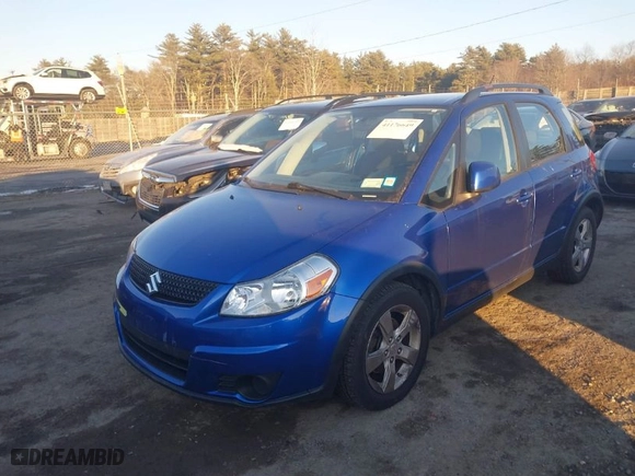 2012 Suzuki SX4 Crossover with VIN JS2YB5A34C6305897, listed as a IAAI auction lot 41176649 with 98,460 mi miles. Bid and sale history available at carsss.com. Image 2.