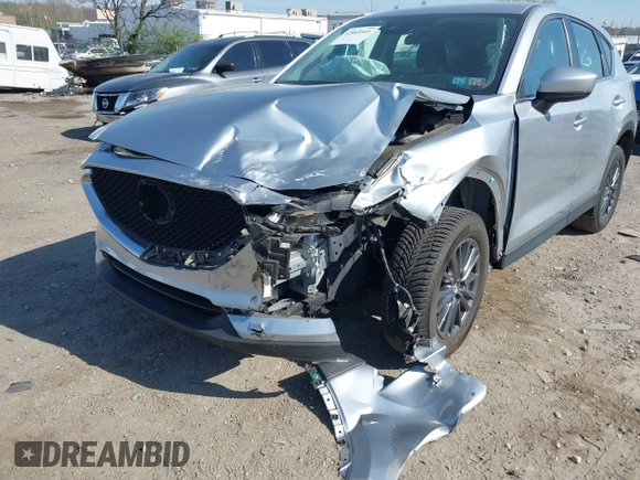 2019 Mazda CX-5 Sport with VIN JM3KFBBM7K0668830, listed as a IAAI auction lot 42069505 with Not Provided miles and . Bid and sale history available at DreamBid. Image 6.