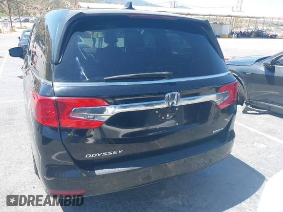 2018 Honda Odyssey Touring with VIN 5FNRL6H8XJB026247, listed as a IAAI auction lot 42298961 with 66,571 mi miles and . Bid and sale history available at DreamBid. Image 16.