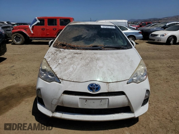2014 Toyota Prius One with VIN JTDKDTB32E1082370, listed as a Copart auction lot 57522765 with 261,566 mi miles and Clean Title. Bid and sale history available at DreamBid. Image 5.