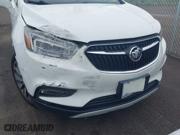 2019 Buick Encore Essence with VIN KL4CJGSM2KB876329, listed as a IAAI auction lot 42101397 with 84,020 mi miles. Bid and sale history available at carsss.com. Image 6.