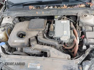 2015 Ford Fusion S Hybrid with VIN 3FA6P0UU4FR111409, listed as a IAAI auction lot 41447316 with 150,068 mi miles. Bid and sale history available at carsss.com. Image 10.