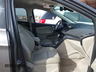 2014 Ford Escape Titanium with VIN 1FMCU0JX5EUC00297, listed as a IAAI auction lot 41928316 with 146,406 mi miles. Bid and sale history available at carsss.com. Image 5.