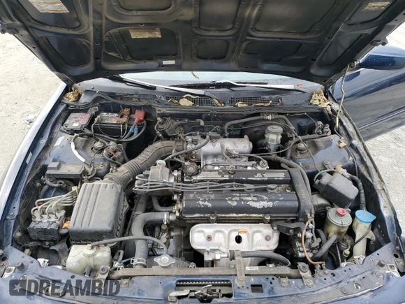 1998 Acura Integra LS with VIN JH4DB7653WS002571, listed as a Copart auction lot 73806394 with 258,143 mi miles and Salvage title. Bid and sale history available at DreamBid. Image 11.