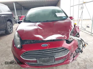 2017 Ford Fiesta SE z VIN 3FADP4BJ9HM159284, wystawiony jako IAAI lot #41291003 z przebiegiem 79 668 mil mil oraz . Historia ofert i sprzedaży dostępna na DreamBid. Obrazek 13.