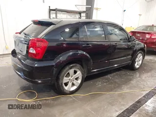 2011 Dodge Caliber Mainstreet with VIN 1B3CB3HA2BD148279, listed as a IAAI auction lot 42150488 with 131,278 mi miles and . Bid and sale history available at DreamBid. Image 4.
