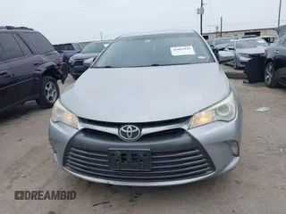 2015 Toyota Camry XLE with VIN 4T4BF1FKXFR472201, listed as a IAAI auction lot 41883944 with 143,296 mi miles and . Bid and sale history available at DreamBid. Image 13.
