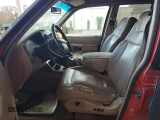 1999 Ford Explorer Eddie Bauer z VIN 1FMDU32X2XZA30166, wystawiony jako Copart lot #77955094 z przebiegiem 212 805 mil mil oraz Szkoda całkowita • Salvage title. Historia ofert i sprzedaży dostępna na DreamBid. Obrazek 7.