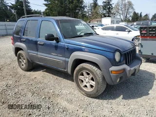 2003 Jeep Liberty Sport with VIN 1J4GL48K83W692264, listed as a Copart auction lot 54525105 with 176,056 mi miles and Salvage Title. Bid and sale history available at carsss.com. Image 4.