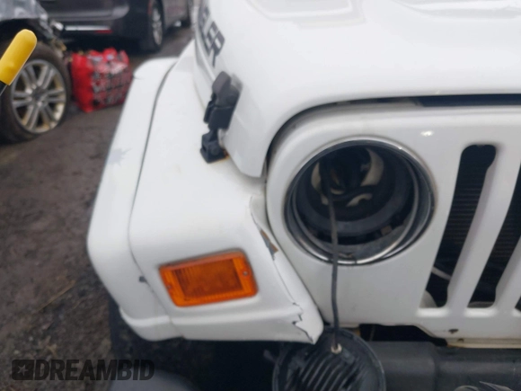 1997 Jeep Wrangler Sahara with VIN 1J4FY49S1VP503639, listed as a IAAI auction lot 41708134 with 102,196 mi miles and . Bid and sale history available at carsss.com. Image 6.