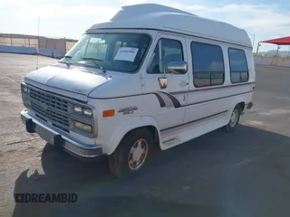 1995 Chevrolet Chevy Van z VIN 1GBEG25K5SF131291, wystawiony jako IAAI lot #41861888 z przebiegiem 90 365 mil mil oraz . Historia ofert i sprzedaży dostępna na DreamBid. Obrazek 2.