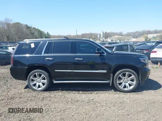 2015 Chevrolet Tahoe LT with VIN 1GNSKBKC5FR229193, listed as a IAAI auction lot 42079931 with Not provided miles and . Bid and sale history available at DreamBid. Image 12.
