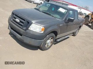 2007 Ford F-150 STX with VIN 1FTRX12W57FB45746, listed as a IAAI auction lot 41786902 with 242,405 mi miles and . Bid and sale history available at DreamBid. Image 2.