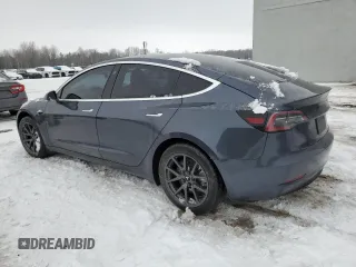 2019 Tesla Model 3 Mid Range with VIN 5YJ3E1EA1KF528950, listed as a Copart auction lot 43344475 with 57,272 mi miles and Clean Title. Bid and sale history available at DreamBid. Image 2.