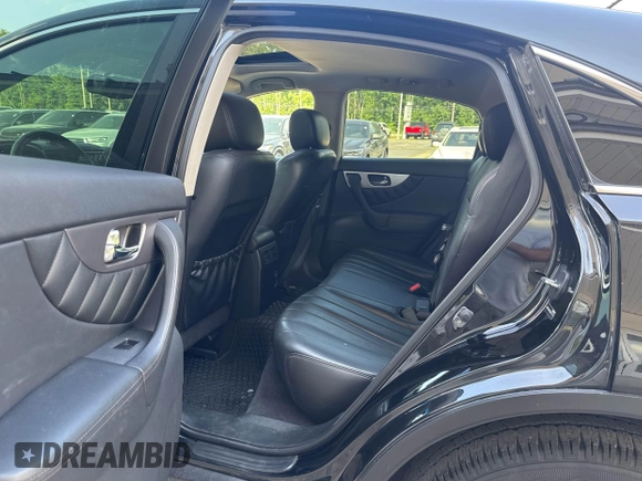 2014 Infiniti QX70 with VIN JN8CS1MW1EM411715, listed as a IAAI auction lot 42769793 with 180,472 mi miles and . Bid and sale history available at DreamBid. Image 8.