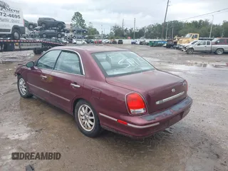 2003 Hyundai XG with VIN KMHFU45E43A257473, listed as a IAAI auction lot 41385881 with 184,165 mi miles. Bid and sale history available at carsss.com. Image 3.