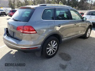 2016 Volkswagen Touareg Sport с VIN WVGEF9BP0GD012604, выставлен на аукционе Copart как лот 85132214 с пробегом 127 155 миль миль и Чистый • Clean title. История ставок и продаж доступна на DreamBid. Изображение 3.