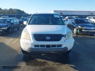 2004 Honda Pilot EX with VIN 2HKYF18564H571427, listed as a IAAI auction lot 41867906 with 359,577 mi miles. Bid and sale history available at carsss.com. Image 12.