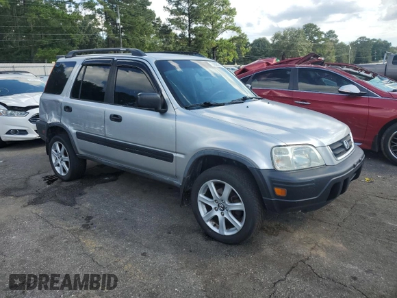 2001 Honda CR-V LX with VIN JHLRD28401S008073, listed as a Copart auction lot 73002564 with 177,059 mi miles and Salvage Title. Bid and sale history available at carsss.com. Image 4.