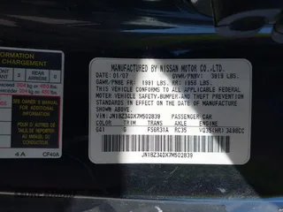 2007 Nissan 350Z Touring with VIN JN1BZ34DX7M502839, listed as a IAAI auction lot 42046017 with 169,376 mi miles. Bid and sale history available at carsss.com. Image 9.