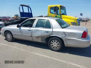 2005 Ford Crown Victoria LX с VIN 2FAFP74W75X166169, выставлен на аукционе IAAI как лот 42406708 с пробегом 85 372 миль миль и . История ставок и продаж доступна на DreamBid. Изображение 6.