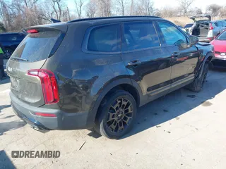 2022 Kia Telluride EX with VIN 5XYP3DHC1NG237397, listed as a IAAI auction lot 41615628 with 44,732 mi miles and . Bid and sale history available at carsss.com. Image 4.