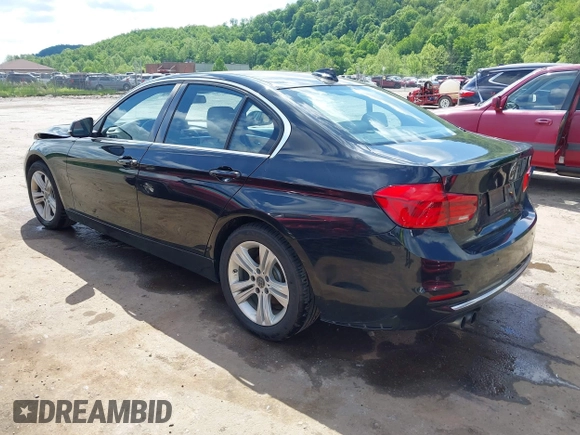 2017 BMW 3 Series 330i xDrive with VIN WBA8D9C32HA011814, listed as a IAAI auction lot 42254352 with 104,547 mi miles and . Bid and sale history available at DreamBid. Image 3.