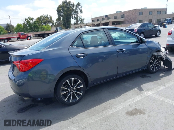 2017 Toyota Corolla L with VIN 5YFBURHE2HP641332, listed as a IAAI auction lot 42485206 with 75,532 mi miles and . Bid and sale history available at DreamBid. Image 4.