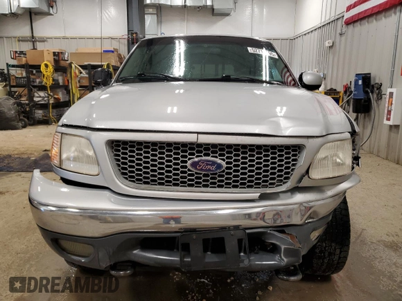 1999 Ford F-150 with VIN 1FTRX18W2XKB01444, listed as a Copart auction lot 52717195 with 210,581 mi miles and Clean title. Bid and sale history available at DreamBid. Image 5.
