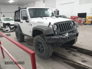 2016 Jeep Wrangler Sport with VIN 1C4AJWAG9GL261958, listed as a IAAI auction lot 41595490 with 32,433 mi miles and . Bid and sale history available at carsss.com. Image 1.