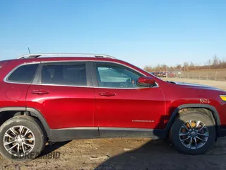 2019 Jeep Cherokee Latitude Plus with VIN 1C4PJMLB9KD410730, listed as a IAAI auction lot 41762344 with 82,097 mi miles and . Bid and sale history available at carsss.com. Image 13.