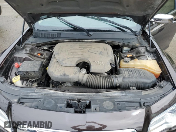 2012 Chrysler 300 Limited with VIN 2C3CCACG1CH205754, listed as a Copart auction lot 60832815 with 119,376 mi miles and Salvage title. Bid and sale history available at DreamBid. Image 11.